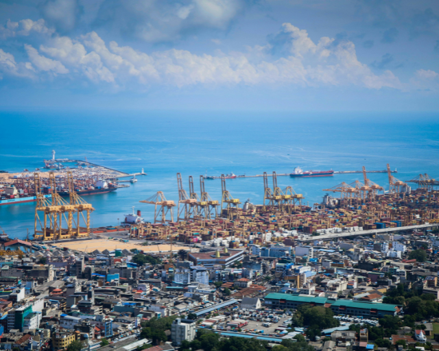 A professional handshake symbolizing a new investment partnership or agreement closed by the Sri Lanka Opportunity Fund.